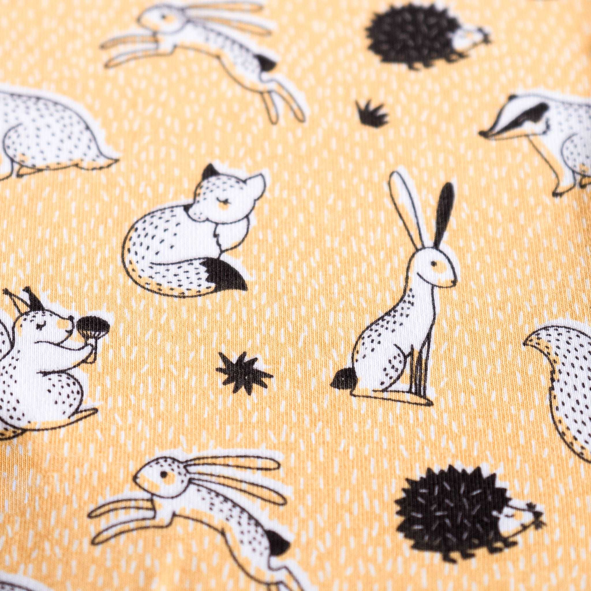 The Furry Forest Friends ZippySuit. The perfect baby grow has a 2-way zip for quick and easy changes, foldable mitts and foldable feet pouches.